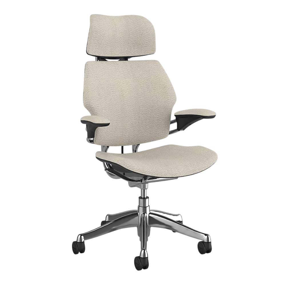 Front angled view of Crate & Barrel Humanscale® Freedom Headrest White Boucle Office Chair with white boucle upholstery, padded armrests, and a chrome wheeled base