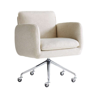 Front angled view of Crate & Barrel Jens Plush Ivory Office Chair featuring rounded arms, a soft cushioned seat, and a polished chrome rolling base