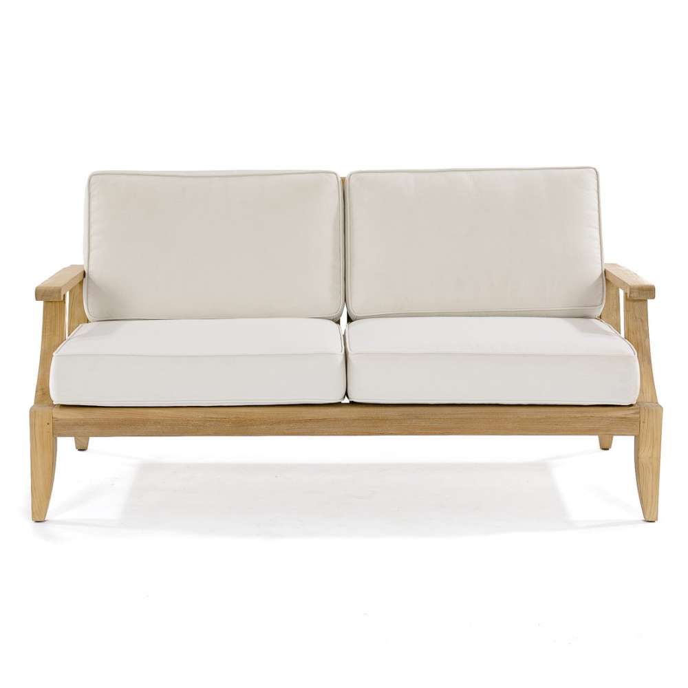 Front-facing view of Westminster Teak Laguna Sofa shows two thick seat cushions and two back cushions resting on the teak frame