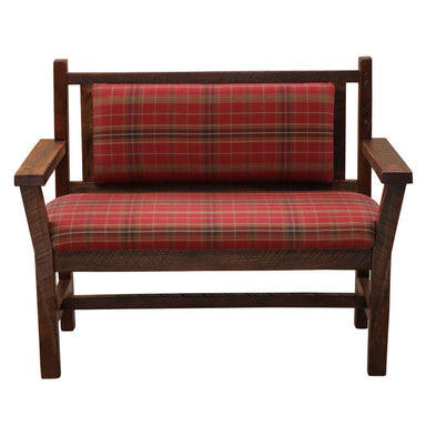 Front-facing image of Fireside Lodge Barnwood Upholstered Bench with Arms and Back highlights its sturdy build, wide armrests, and cozy red plaid upholstery