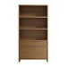 Front view of Crate & Barrel Keane 40" Driftwood Storage Bookcase with open shelving, a drawer, and cabinet storage below