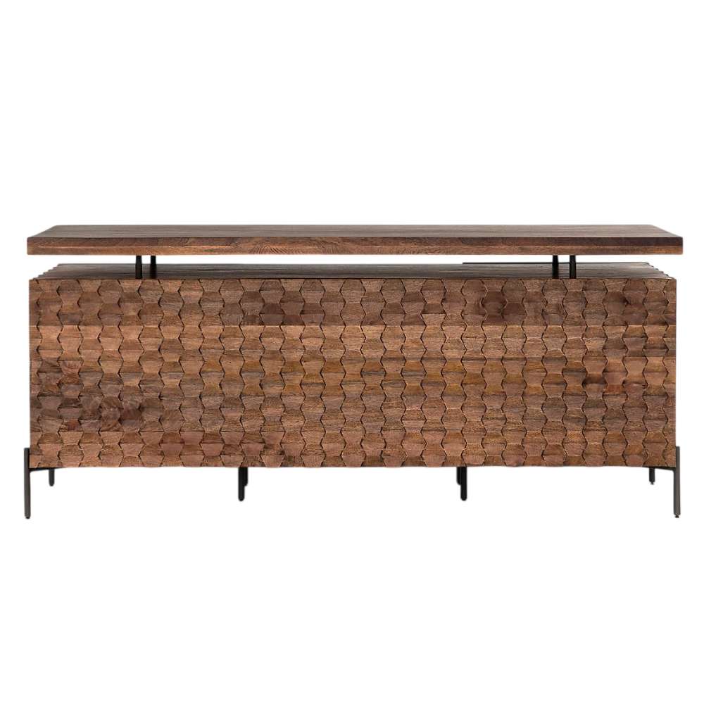 Front view of Crate & Barrel Raffael Carved Wood Executive Desk showing its carved geometric wood front and slim black metal legs