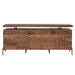 Front view of Crate & Barrel Raffael Carved Wood Executive Desk showing its carved geometric wood front and slim black metal legs