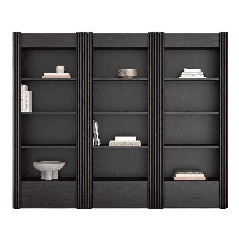 Front view of Crate & Barrel Siena 102" Black Wood 4-Shelf Storage Bookcase with Drawer, Set of 3 styled with books and decorative accents across twelve open shelves