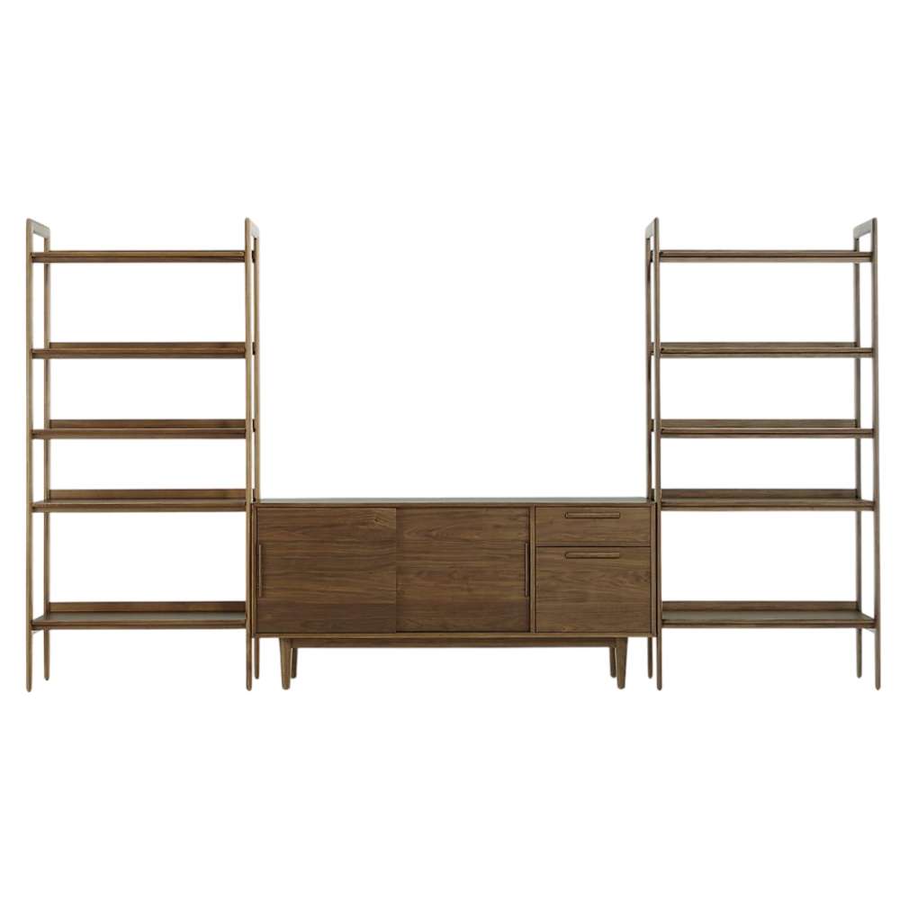 Front view of Crate & Barrel Tate 136.5" Walnut Storage Media Console and Bookshelf Set featuring open shelving, sliding doors, and file storage