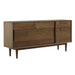 Front view of Crate & Barrel Tate 64.5" Walnut Storage Media Console showcasing sliding doors, drawers, and sleek tapered legs