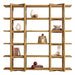 Front view of Crate & Barrel Thomas Barley Oak Wood Wide Open Bookcase/Room Divider decorated with books, pottery, and decorative objects across its open shelves