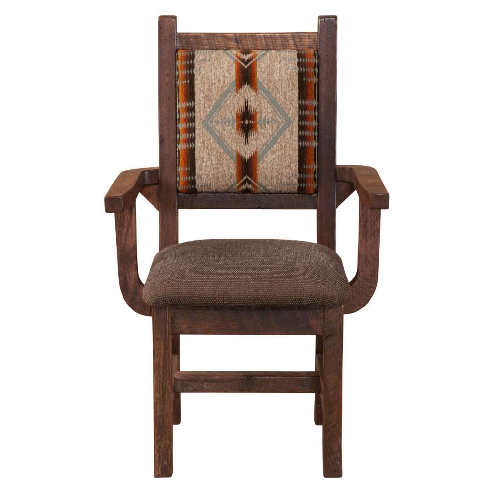 Front view of Fireside Lodge Barnwood Colonial Arm Chair with sturdy wooden arms, a cushioned brown seat, and a decorative woven back panel