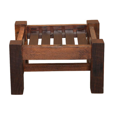 Front view of Fireside Lodge Barnwood Ottoman without the cushion, exposing its rugged wooden base and slatted seat support