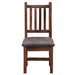 Front view of Fireside Lodge Barnwood Prairie Dining Side Chair showing the sturdy barnwood frame, five back slats, and padded seat