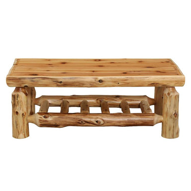 Front view of Fireside Lodge Cedar Log Rectangle Coffee Table - 40" x 20" featuring thick log legs and a slatted lower shelf