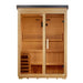 Front view of Golden Designs Arlberg 3 Person Flat Roof Traditional Outdoor Sauna showing a light hemlock cabin, a dark flat roof and a glass door with a guarded stove inside
