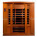 Front view of Golden Designs Dynamic Bergamo 4 Person Low EMF Far Infrared Sauna showing a wide cedar cabin, bronze glass door and rows of carbon panels