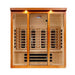 Front view of Golden Designs Dynamic Vila Grande 4 Person Full Spectrum Near Zero EMF Far Infrared Sauna showing a wide cedar cabin, glass doors and glowing accent lights