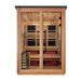 Front view of Golden Designs Kaskinen 6 Person Pacific Cedar Barn Hybrid Outdoor Sauna showing a cedar exterior, double glass doors and infrared heaters inside