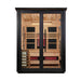 Front view of Golden Designs Loviisa 3 Person Black Barn Hybrid Outdoor Sauna showing a black exterior, double glass doors, a cedar interior and glowing infrared heaters