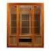Front view of Golden Designs Maxxus Alpine Dual Tech 3 Person Low EMF Far Infrared Sauna showing a cedar-toned cabin, wide glass front and ceramic heater below the bench