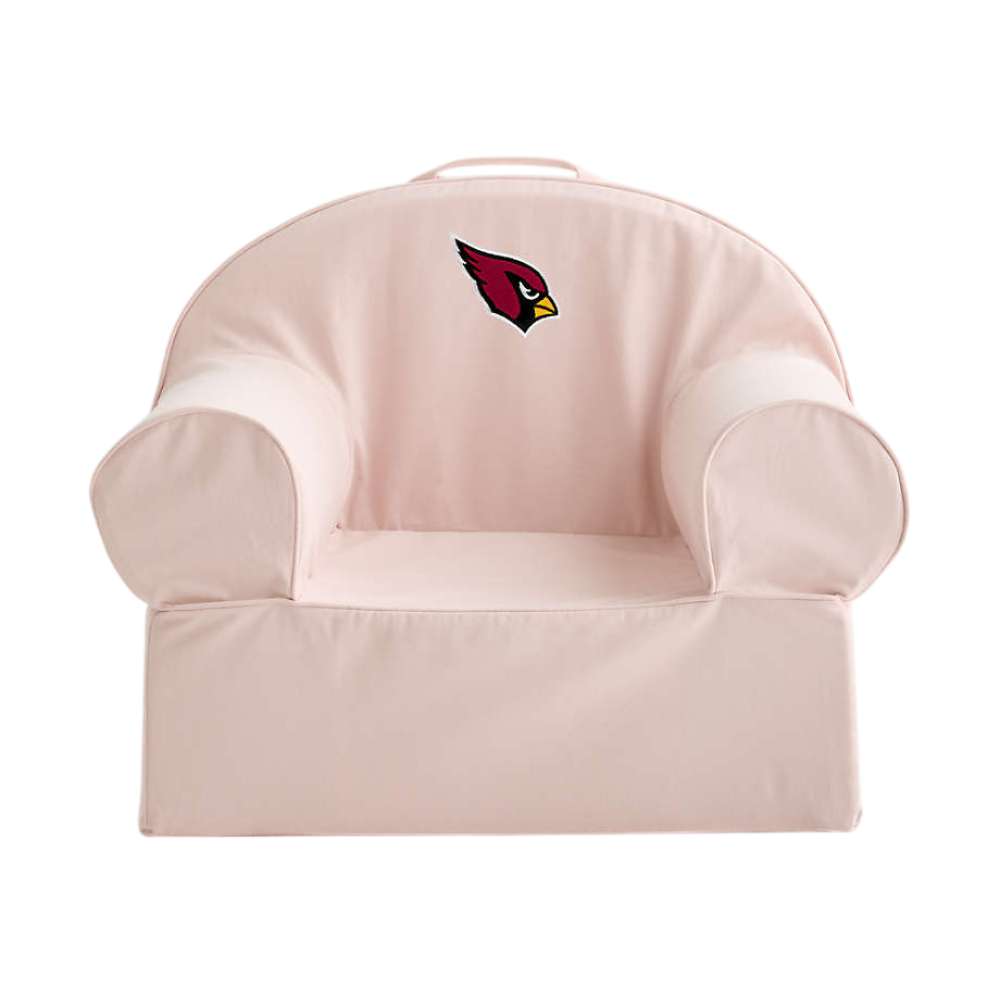 Front view of Soft Pink Crate & Barrel Organic Cotton Kids Lounge Nod Chair with rounded arms, a carry handle, and an Arizona Cardinals logo