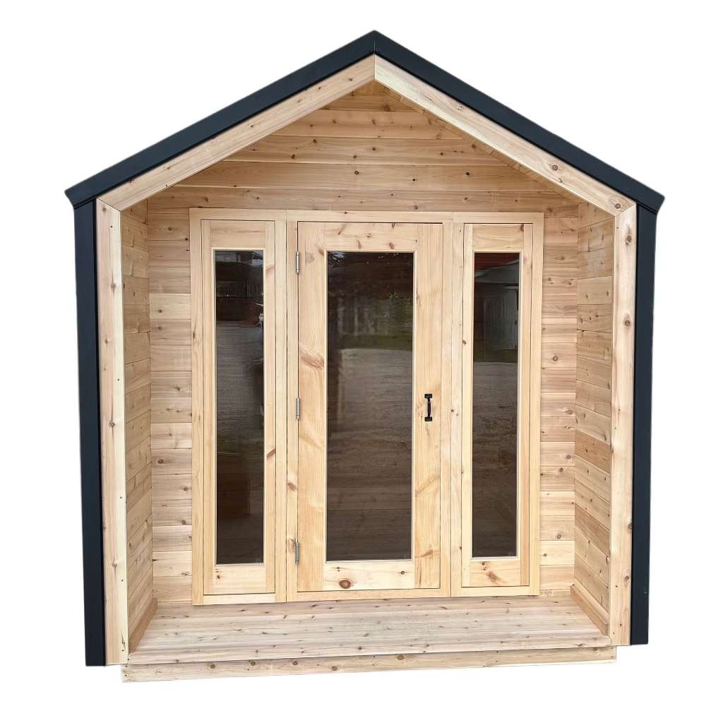 Front view of Sawmill Structures CabinSauna displaying its double glass doors and wooden porch