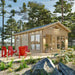Front view of the Sawmill Structures Edwin Lake House PLUS 70MM Garden Room shows a charming wooden cabin with glass doors