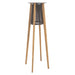 Full view of Westminster Teak Luna Standing Lamp reveals tall, angled wooden legs supporting a modern rope-wrapped light fixture with a flat circular top
