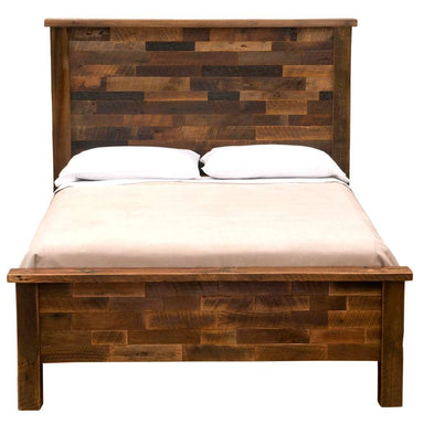 Fully assembled Fireside Lodge Barnwood Americana Bed with a tall wooden headboard, matching footboard, and neatly made mattress