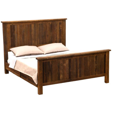 Fully assembled Fireside Lodge Barnwood Traditional Bed shown with a mattress and pillows, featuring a tall headboard and footboard