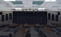 GIK Acoustics Ceiling Acoustic Panel installed in a school cafeteria ceiling helps reduce echo and improve sound clarity in the large dining space