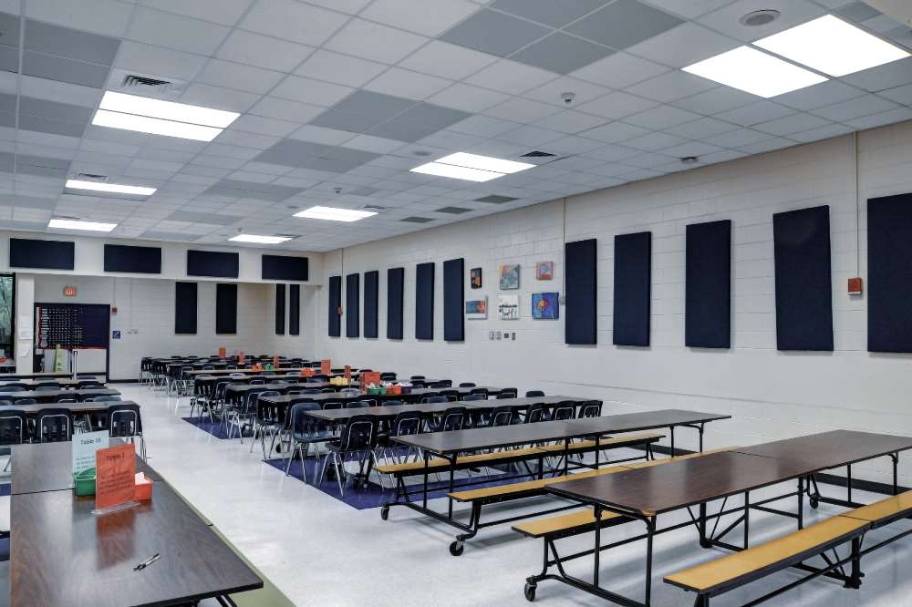 GIK Acoustics Ceiling Acoustic Panel mounted throughout a school cafeteria helps control noise and create a quieter, more comfortable room