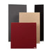 GIK Acoustics Classic Bass Trap acoustic panels displayed in gray, beige, black, and red fabric finishes, standing upright against a light background