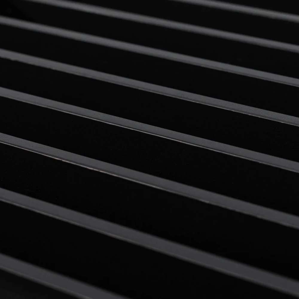 GIK Acoustics Q11D Quadratic Residue Diffuser close-up showing black vertical diffuser fins and channels that create a textured sound-diffusing surface