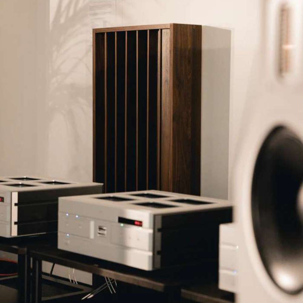 GIK Acoustics Q7D Quadratic Residue Diffuser wall-mounted behind audio equipment to improve sound clarity and reduce reflections