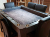 Game Theory Tables Origins Lit Game Table boasts a soft gray playing surface, sleek cup holders, and a modern aesthetic