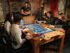 Game Theory Tables The Arena Founders Edition hosts a group of players in an immersive dungeon setting