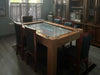 Game Theory Tables The Arena Founders Edition set up in a dining room