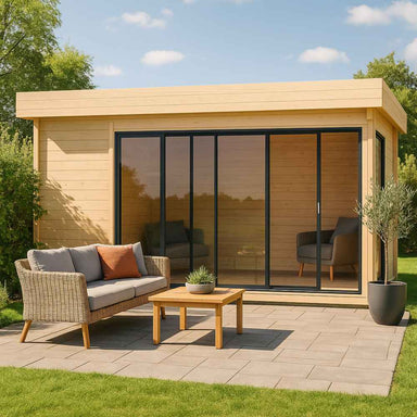 GardenHouse24 USA ALU Concept 70C Garden Room is styled with outdoor seating in front and warm lighting inside