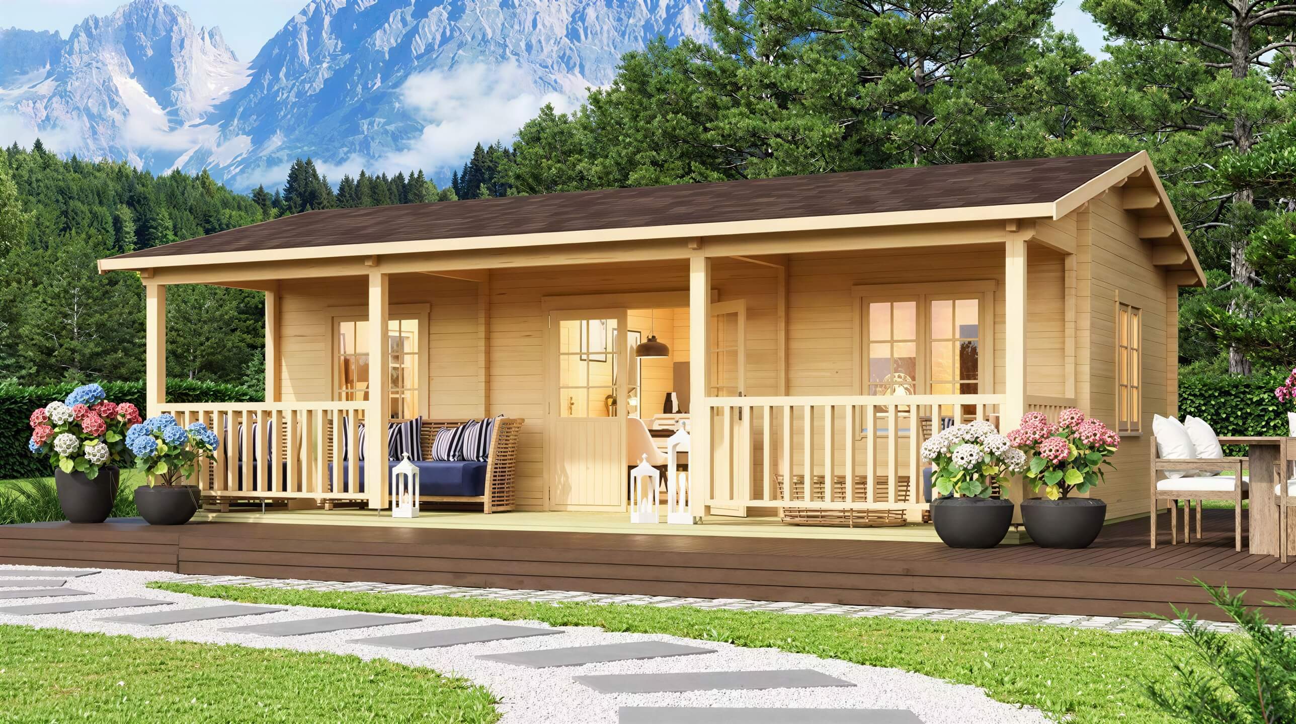GardenHouse24 USA Barrit 70 Garden Room with a spacious front porch surrounded by potted flowers and mountains in the background