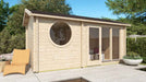GardenHouse24 USA Sauna Sanna 90 Garden Room shows it placed in a sunny outdoor space, surrounded by greenery and outdoor seating