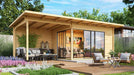 GardenHouse24 USA Starla 44C ALU ISO Garden Room appears beautifully styled with furniture and garden surroundings