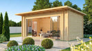 GardenHouse24 USA Starla 44E ALU ISO Garden Room is beautifully staged in a landscaped yard with sunlight pouring through its glass front into the inviting interior