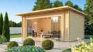 GardenHouse24 USA Starla 44E ALU ISO Garden Room is beautifully staged in a landscaped yard with sunlight pouring through its glass front into the inviting interior