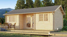 GardenHouse24 USA Wallis 44 Garden Room sits on a wooden deck with outdoor dining furniture in front