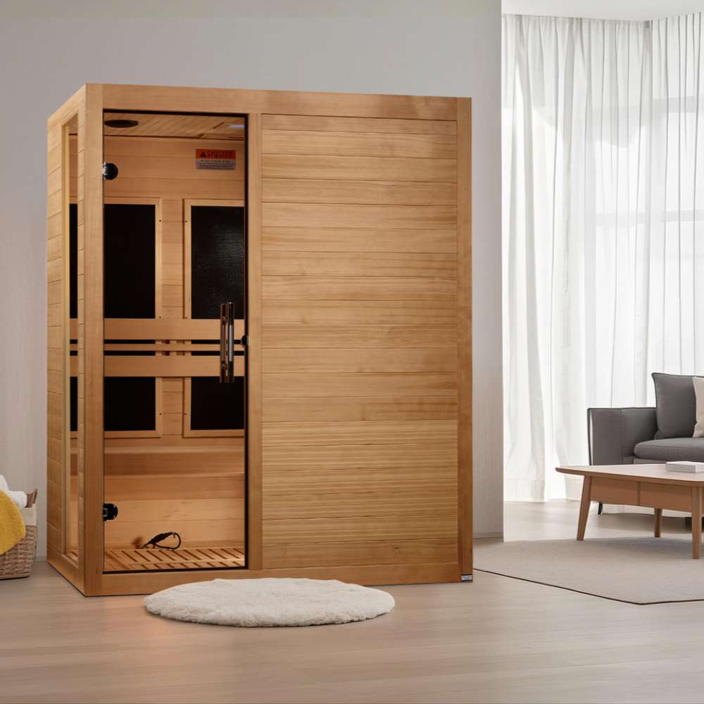 Golden Designs Dynamic Toscana 3 Person Low EMF Far Infrared Sauna stands in a bright living room with a round rug and armchair