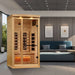 Golden Designs Reserve Edition 1 Person Full Spectrum Sauna with Himalayan Salt Bar stands in a modern living room beside a blue sofa and framed art