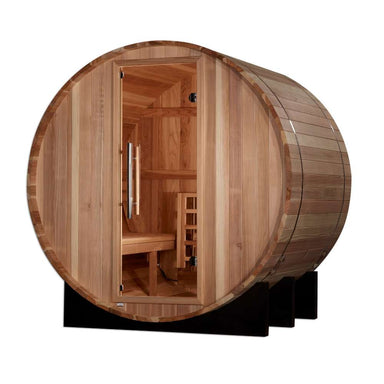 Golden Designs St. Moritz 2 Person Barrel Traditional Sauna rests on black cradles with its glass door showing a guarded stove and cedar benches inside