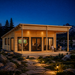 Hedland 70 glowing brightly at night as family and friends watch sports inside beside an illuminated alpine lake in Wyoming’s Wind River Range.