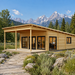 Hedland 70 Multi-Room Freedom House configured as a sunny executive home office in a sagebrush meadow beneath Wyoming’s Teton Range.