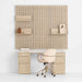 Home office setup with Crate & Barrel Batten 62" White Oak Wood Desk with White Marble Top and Panel Set with 3 Reversible Shelves, paired with a swivel chair and decorative accents