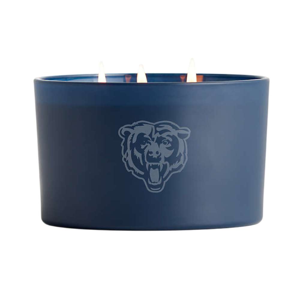 Indigo three-wick Crate & Barrel Monochrome Scented Candle featuring a Chicago Bears logo on the front