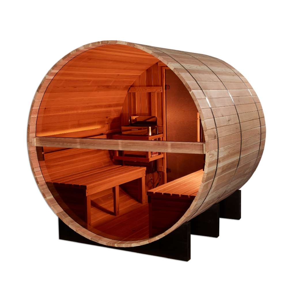 Inside Golden Designs Zurich 4 Person Barrel with Bronze Privacy View Traditional Sauna, cedar benches and a guarded stove sit beside the glass door looking out at palm trees